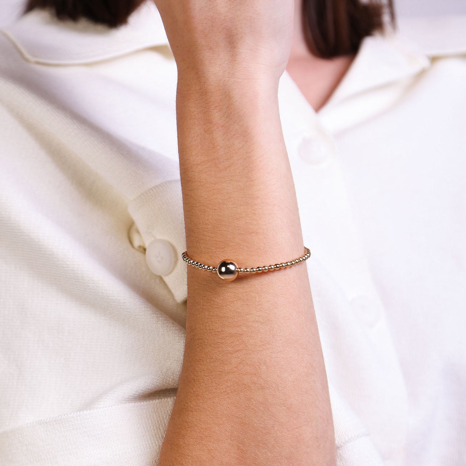 Female Model Wearing Gold Filled Ball Bead Bracelet Capri - Playa Luna Jewelry