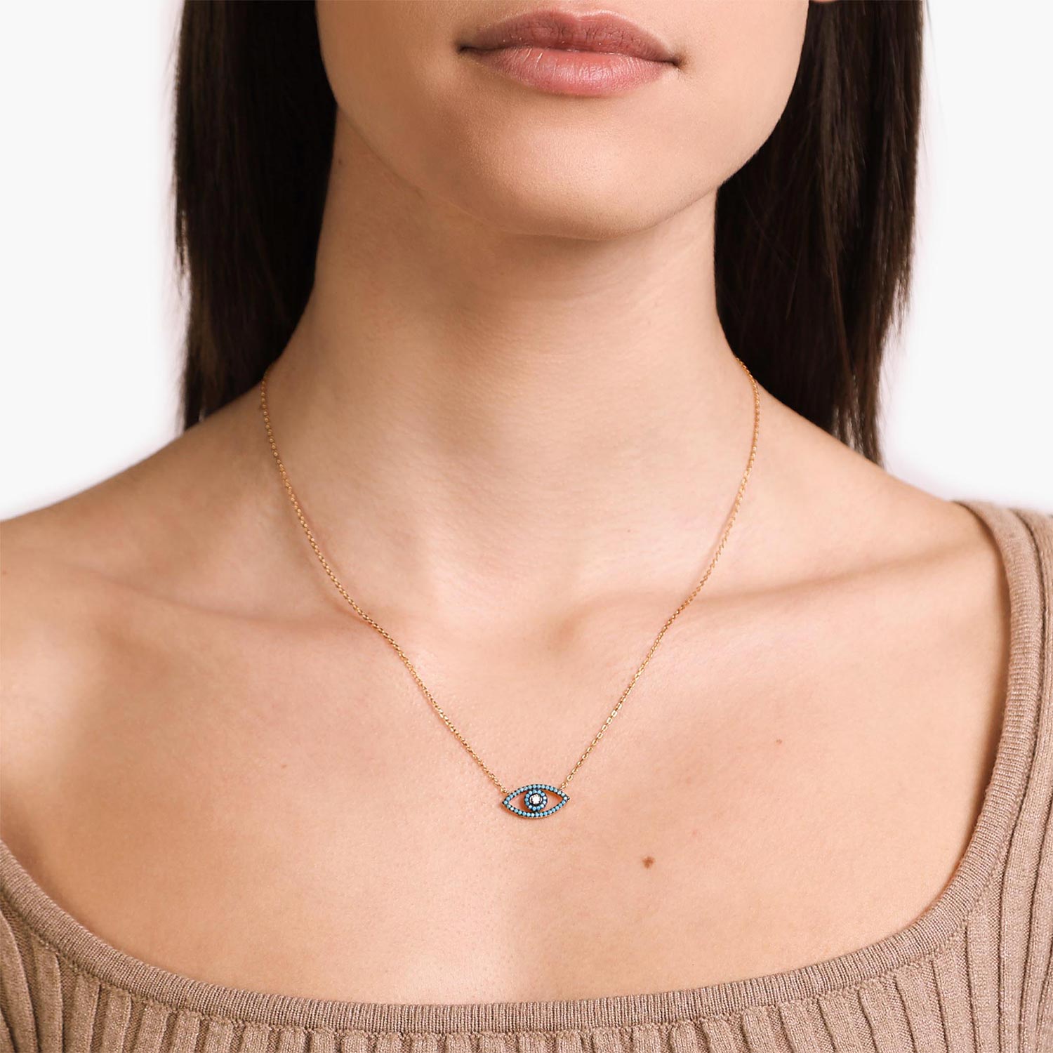 Female Model Wearing Blue and Gold Evil Eye Charm Necklace Cleo - Playa Luna Jewelry