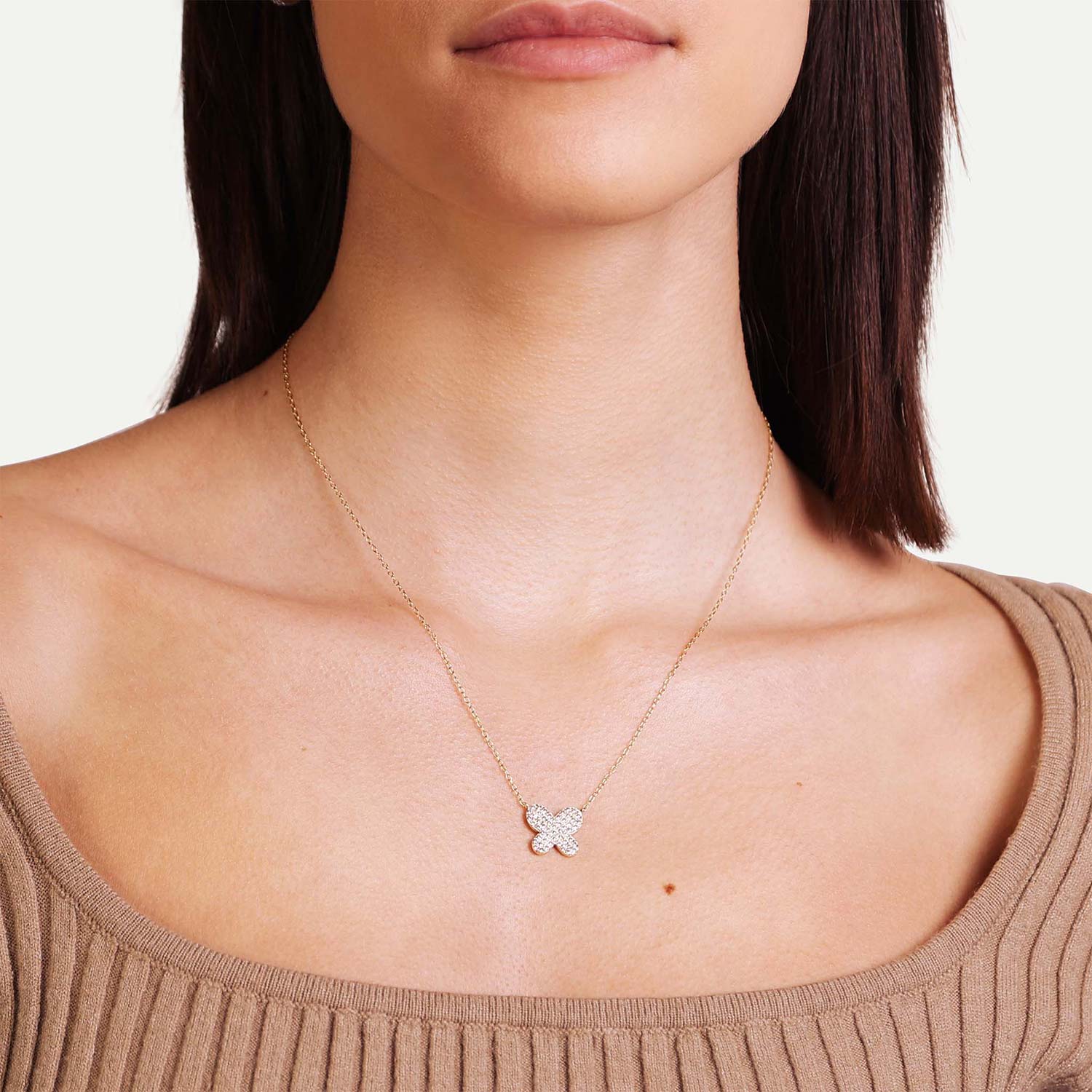 Female Model Wearing Gold Butterfly Necklace Mia - Playa Luna Jewelry