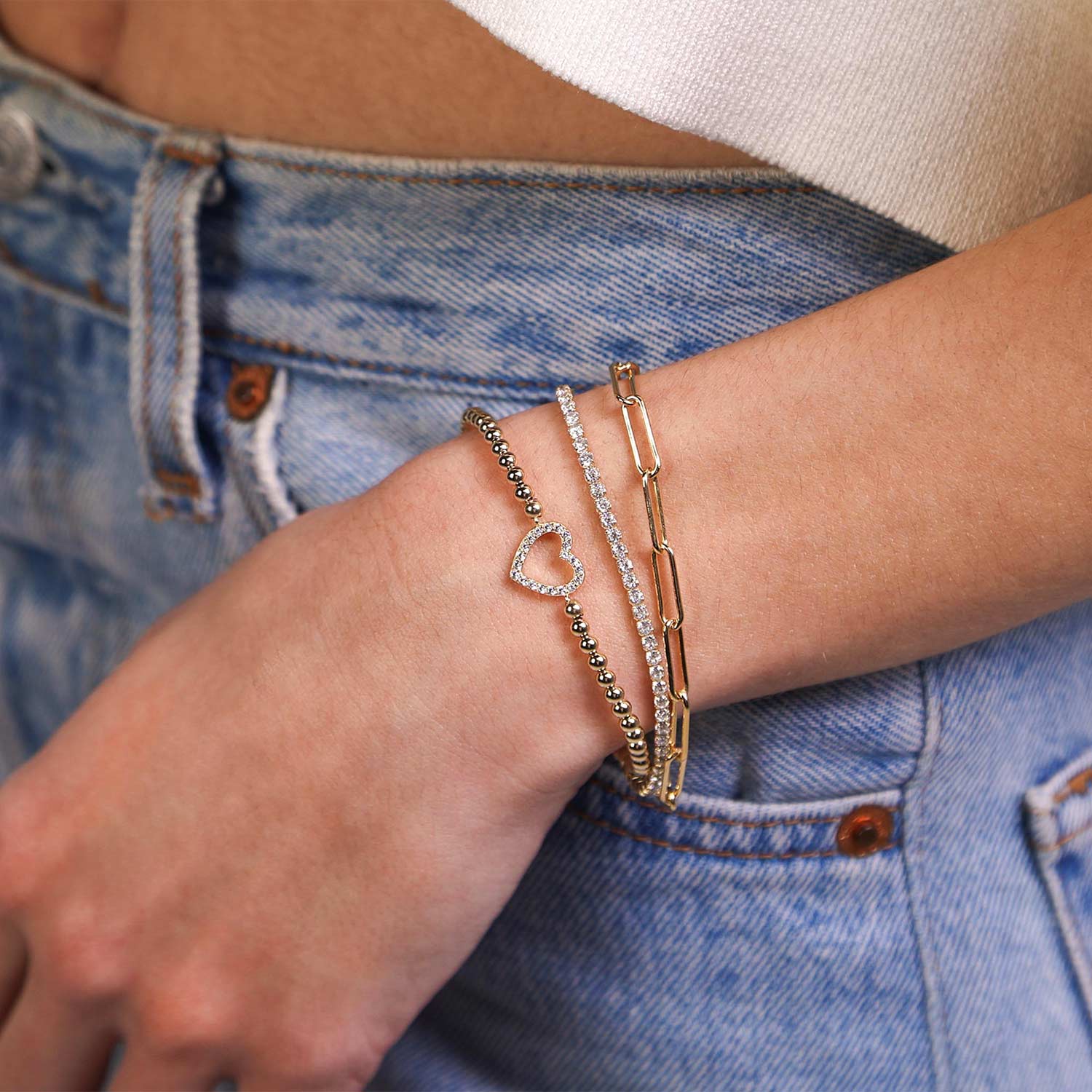 Female Model Wearing Layered Gold Filled Open Heart Bead Bracelet Kim - Playa Luna Jewelry