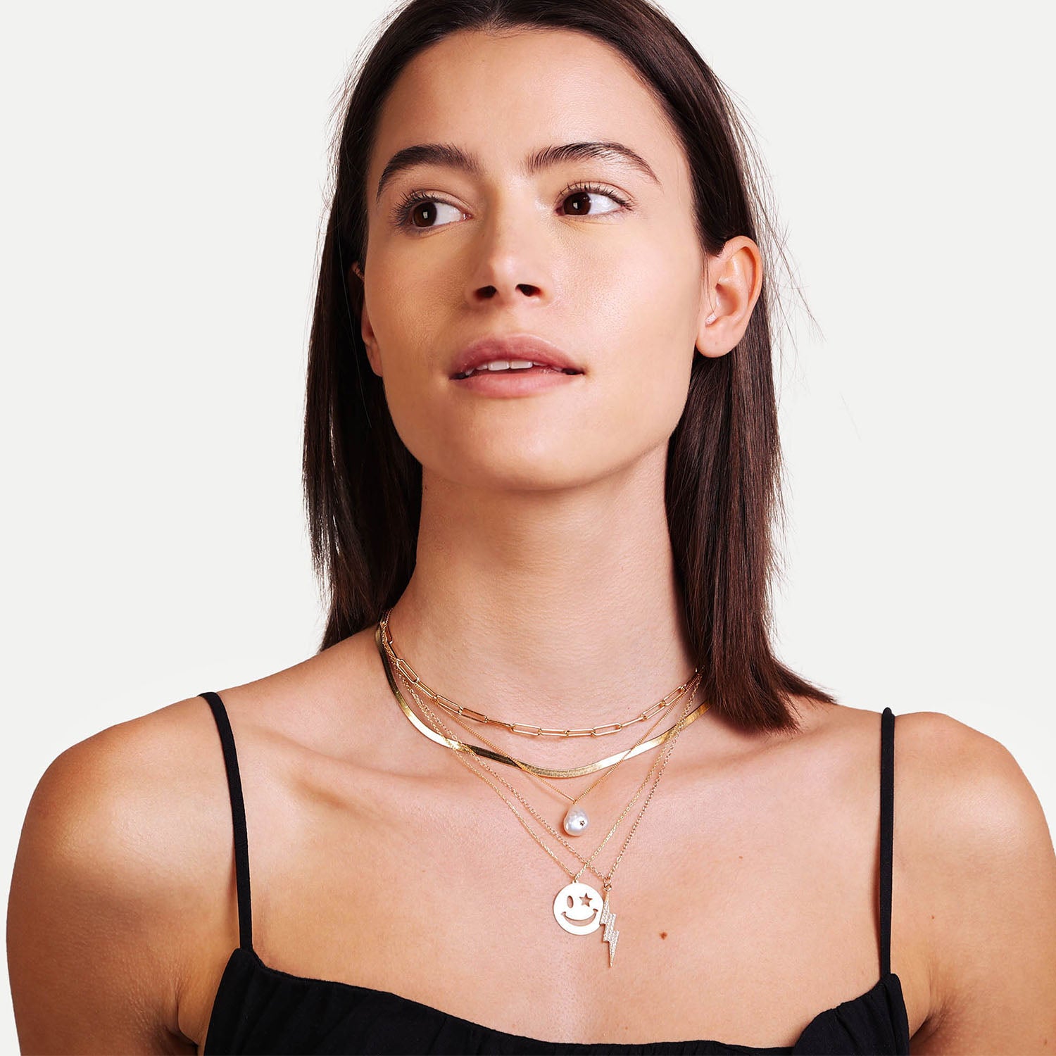 Female Model Wearing Layered Gold Pendant Smiley Face Necklace Alisa - Playa Luna Jewelry