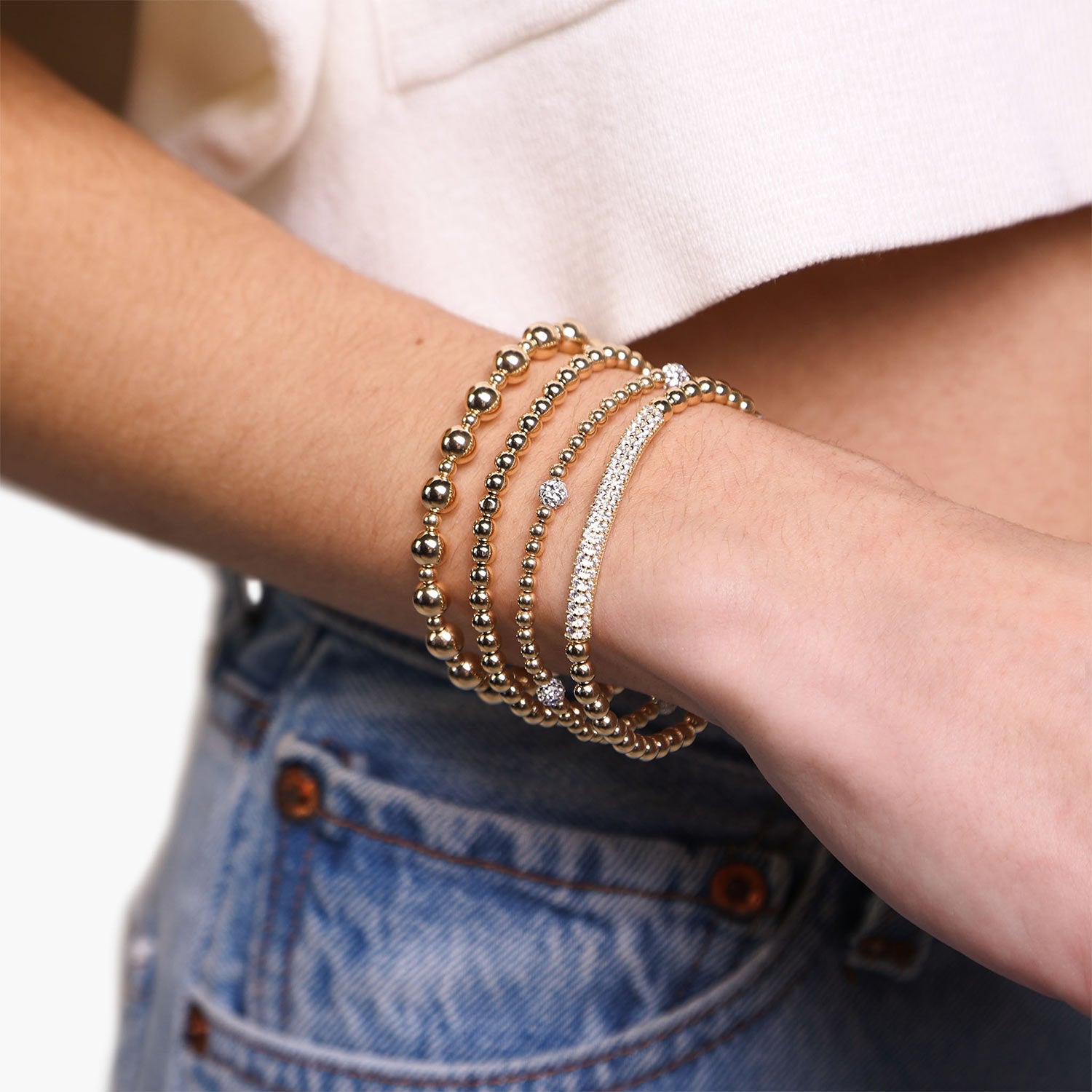 Female Model Wearing Layered Gold Filled Bead Bracelet Ari - Playa Luna Jewelry