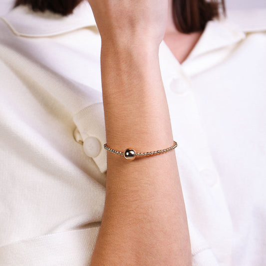 Female Model Wearing Gold Filled Ball Bead Bracelet Capri - Playa Luna Jewelry