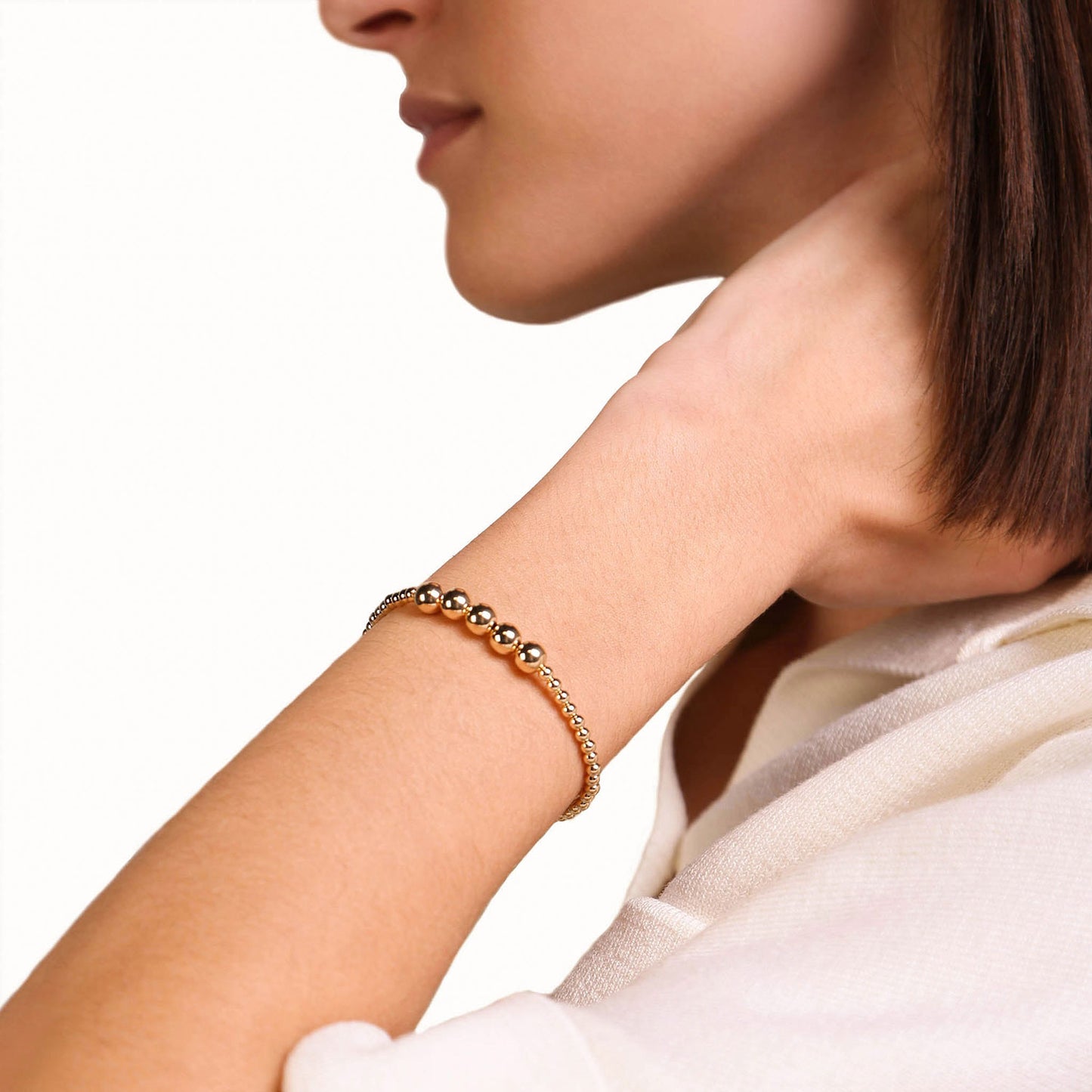 Female Model Wearing Gold Filled Ball Bead Bracelet Riley - Playa Luna Jewelry