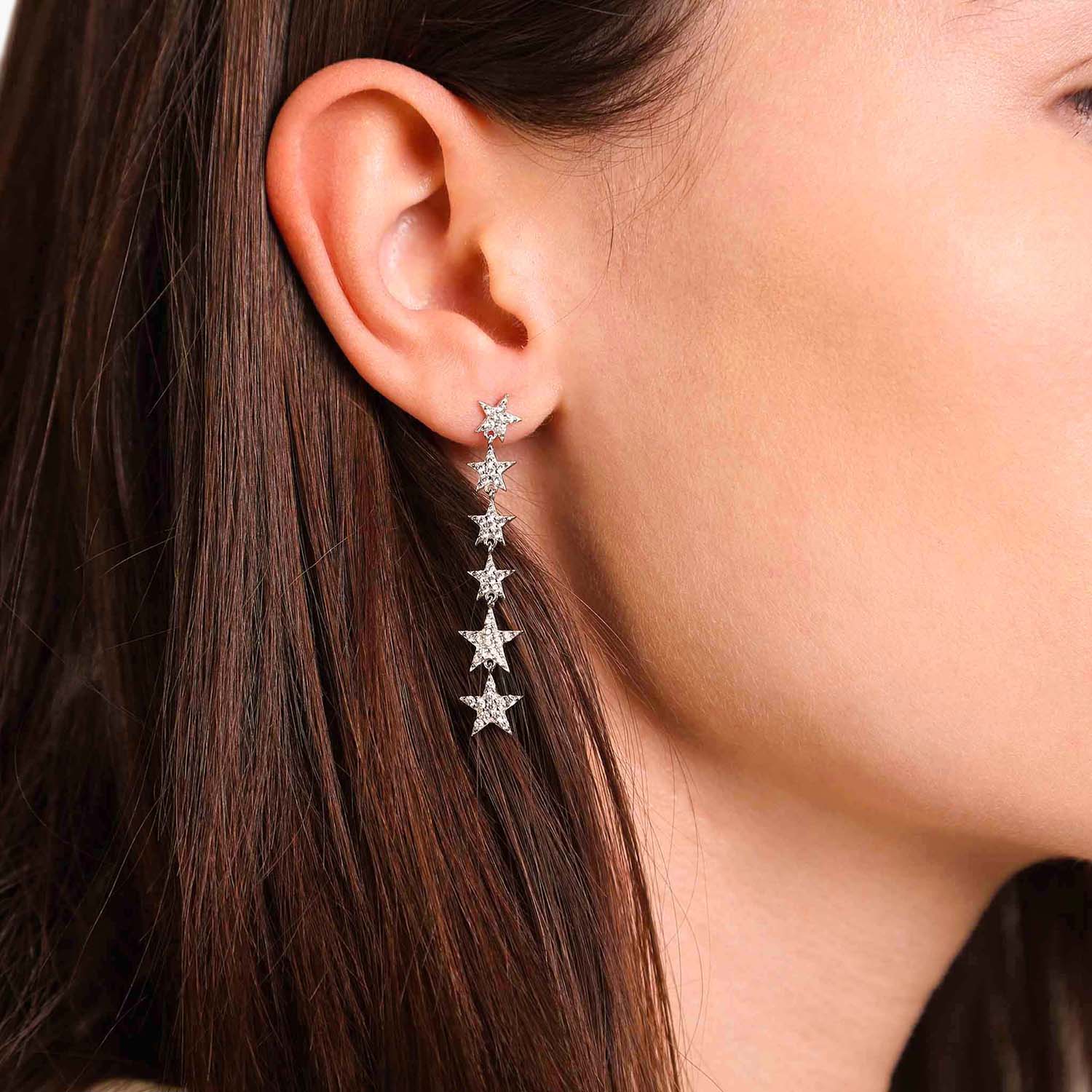 Female Model Wearing Sterling Silver Star Drop Earrings Nova - Playa Luna Jewelry