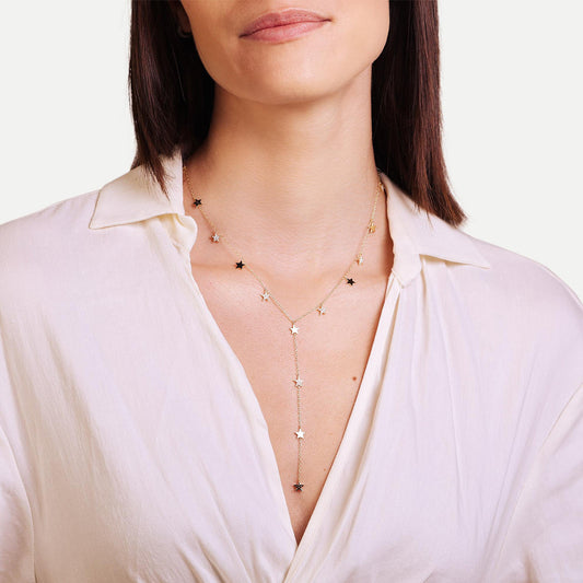 Female Model Wearing Long Gold Star Necklace Chloe