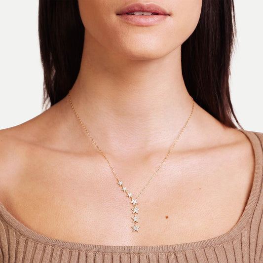Female Model Wearing Gold Star Drop Necklace Ella - Playa Luna Jewelry
