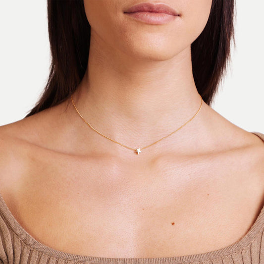 Female Model Wearing Gold Star Necklace Celeste - Playa Luna Jewelry