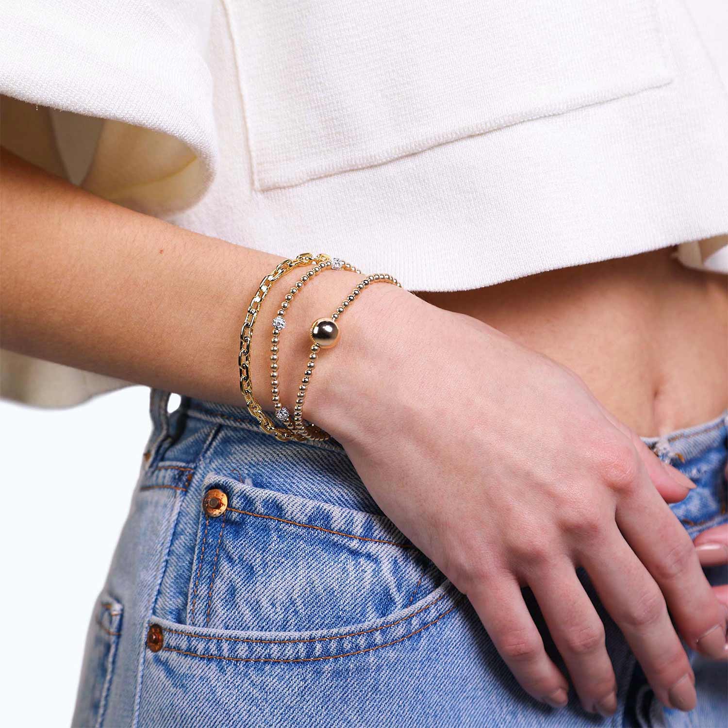 Female Model Wearing Layered Gold Filled Ball Bead Bracelet Capri - Playa Luna Jewelry
