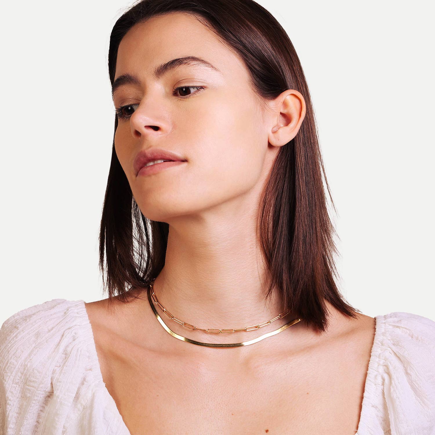 Female Model Wearing Layered Gold Herringbone Chain Elena - Playa Luna Jewelry