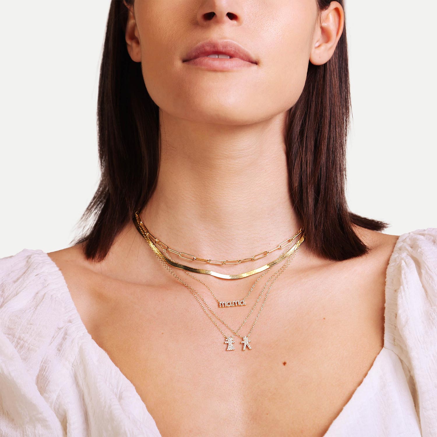Female Model Wearing Layered Gold Boy Charm Necklace Taylor - Playa Luna Jewelry