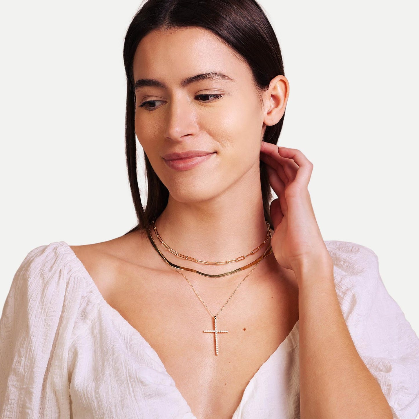 Female Model Wearing Layered Gold Cross Necklace Sarah - Playa Luna Jewelry