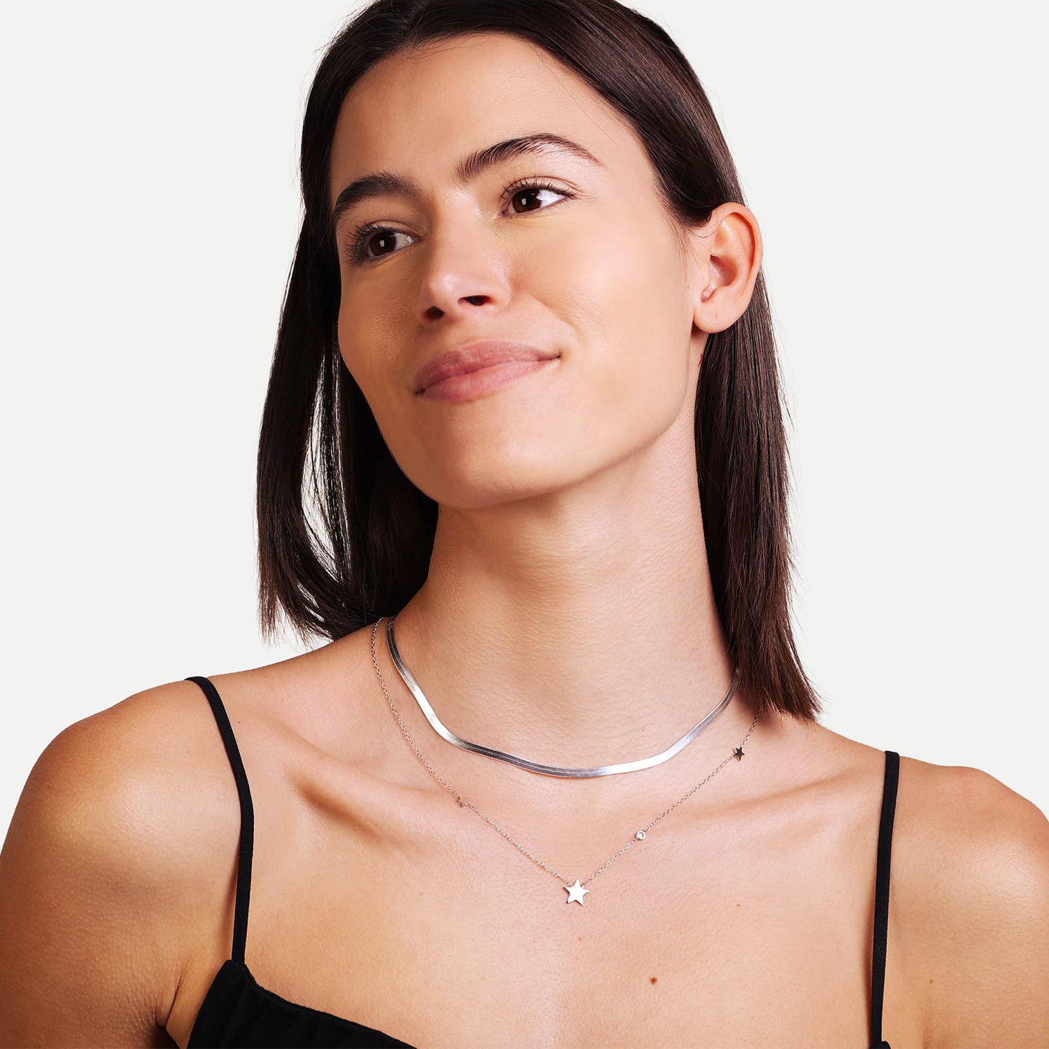 Female Model Wearing Layered Sterling Silver Star Necklace Emma - Playa Luna Jewelry